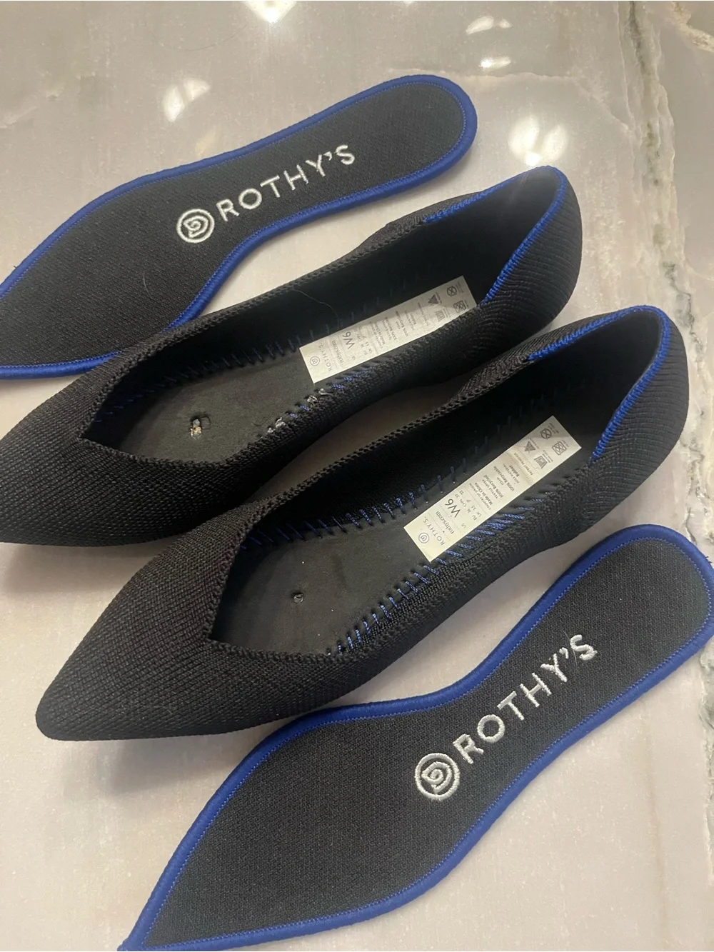 Rothy's Black Pointed Knit Flats with Blue Trim